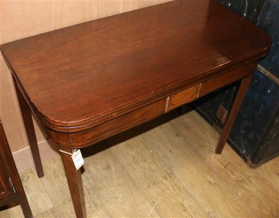 A George mahogany games table, the inner surfaces with chess and backgammon boards, W.95cm